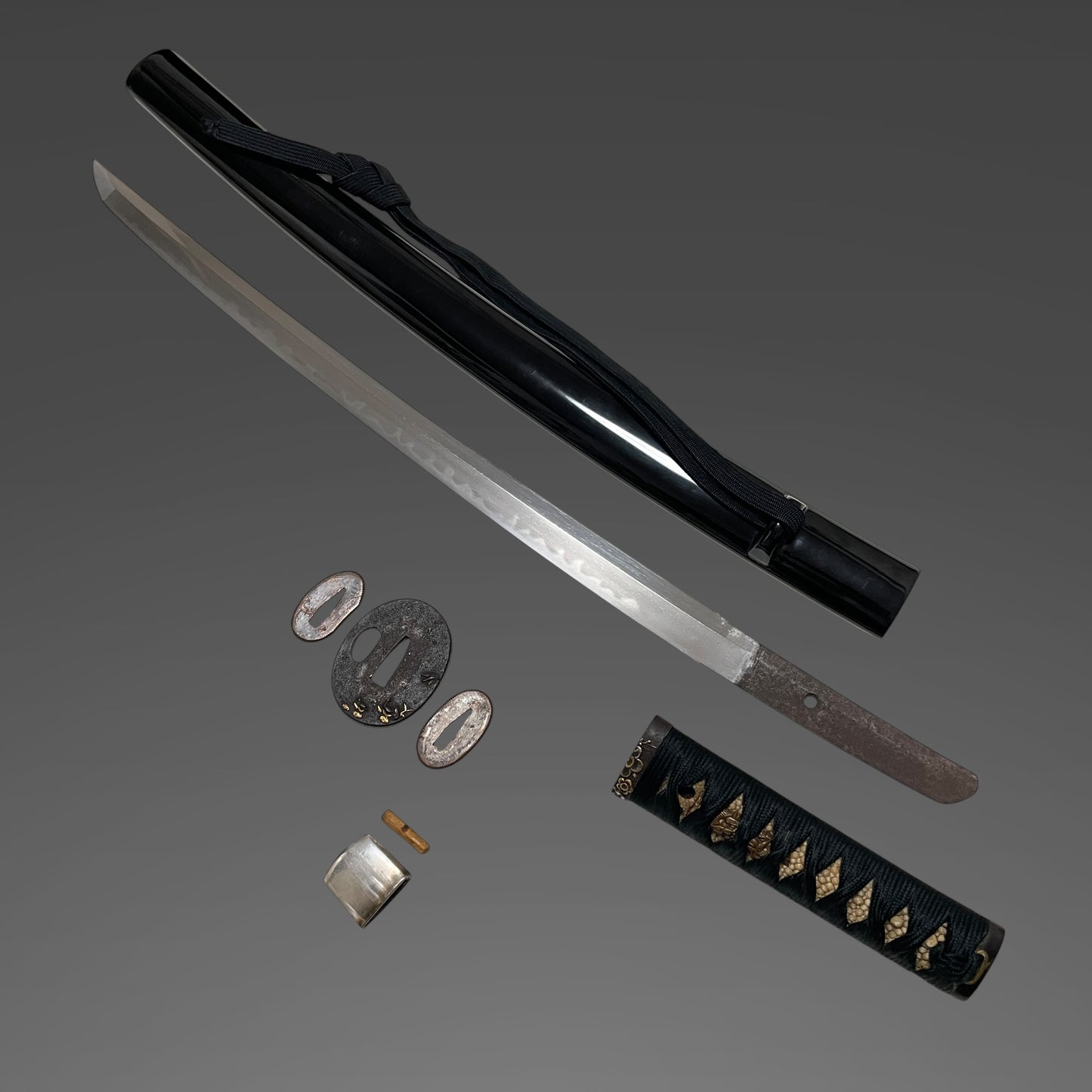Short Black Wakizashi, Dragon Menuki and Bird Tsuba, Edo period mumei