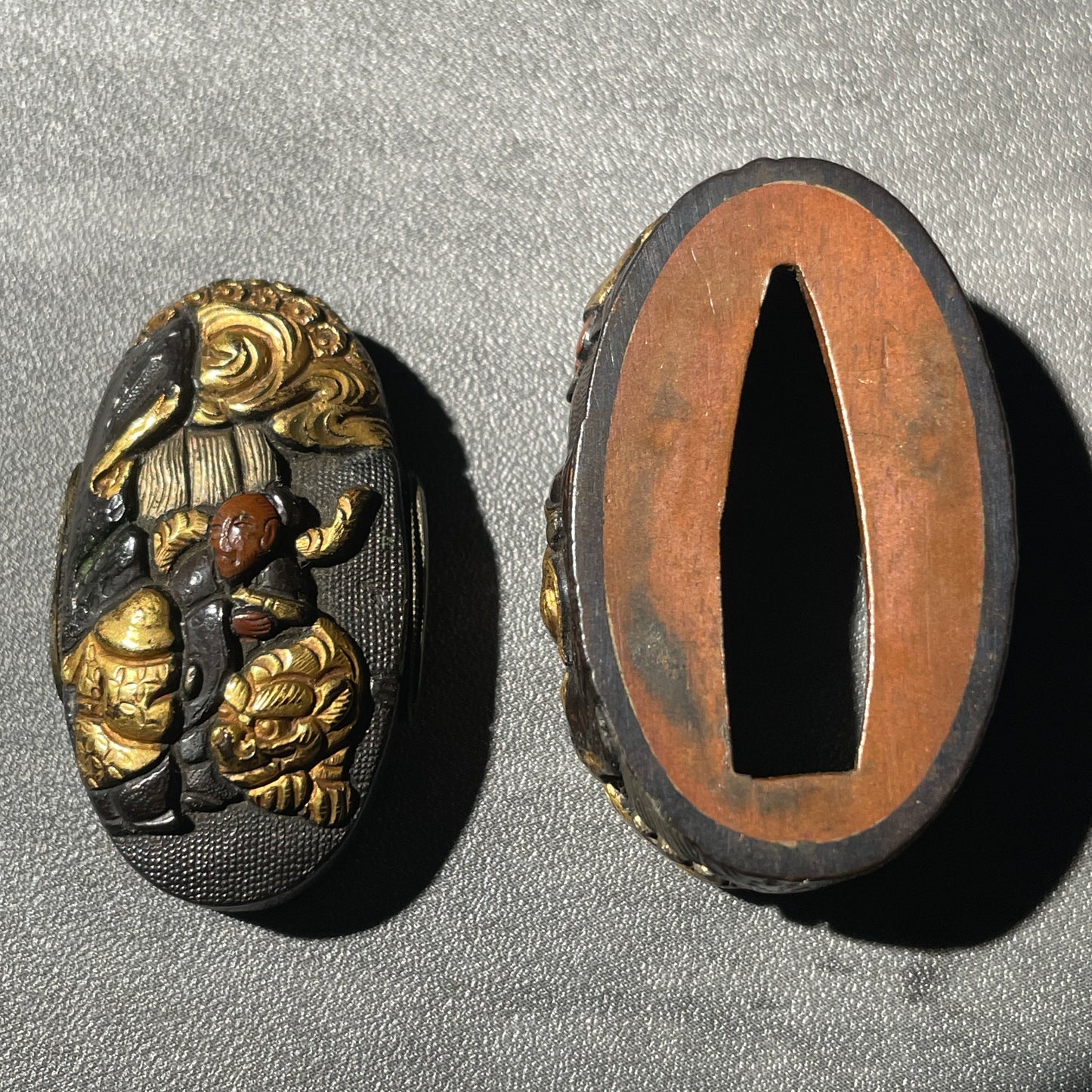 唐人物 (Tojinbutsu) Fuchikashira, Shakudo back, Edo period