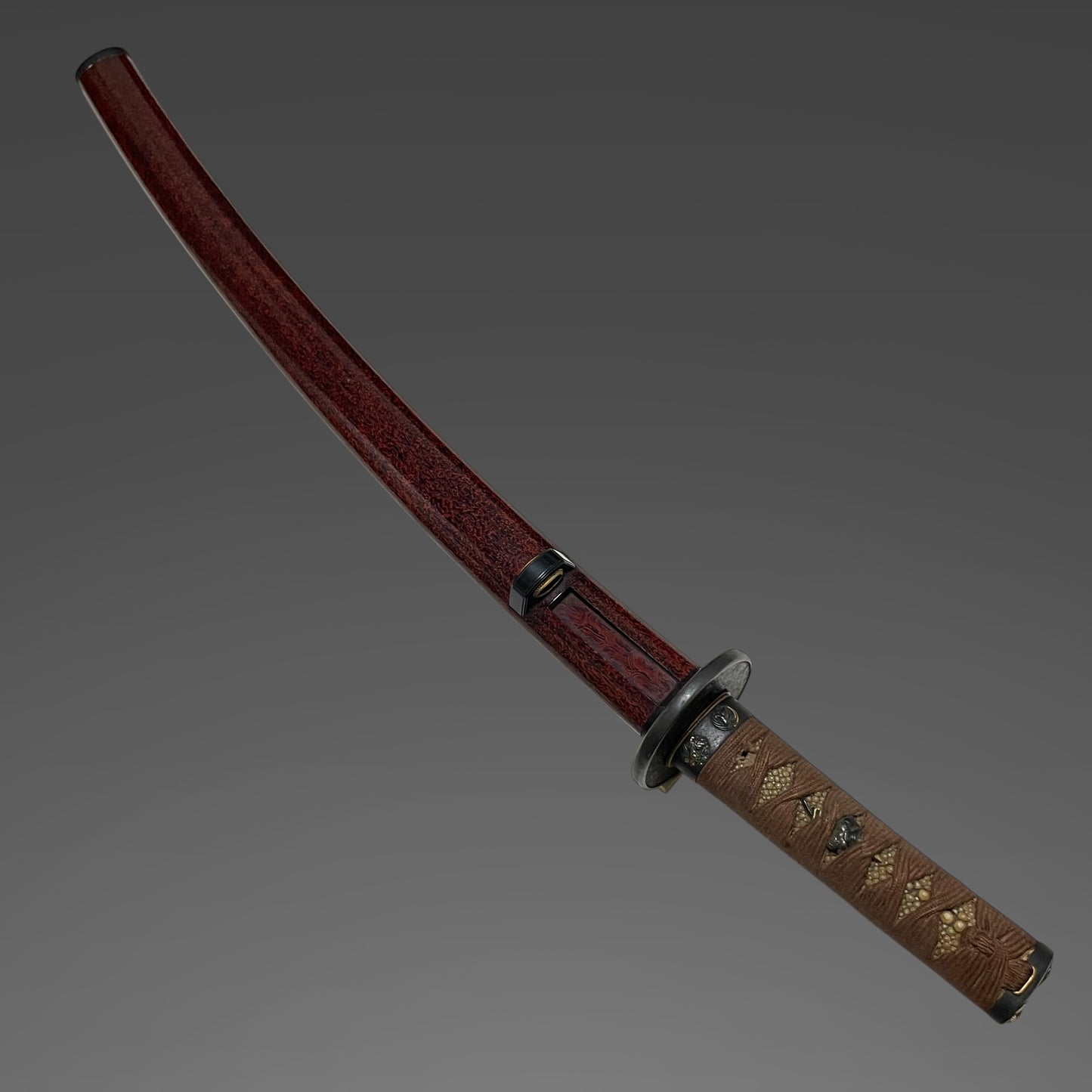 Red Wakizashi Catfish Kozuka,  Tsuda Echizennokami Sukehiro August 1681 signed