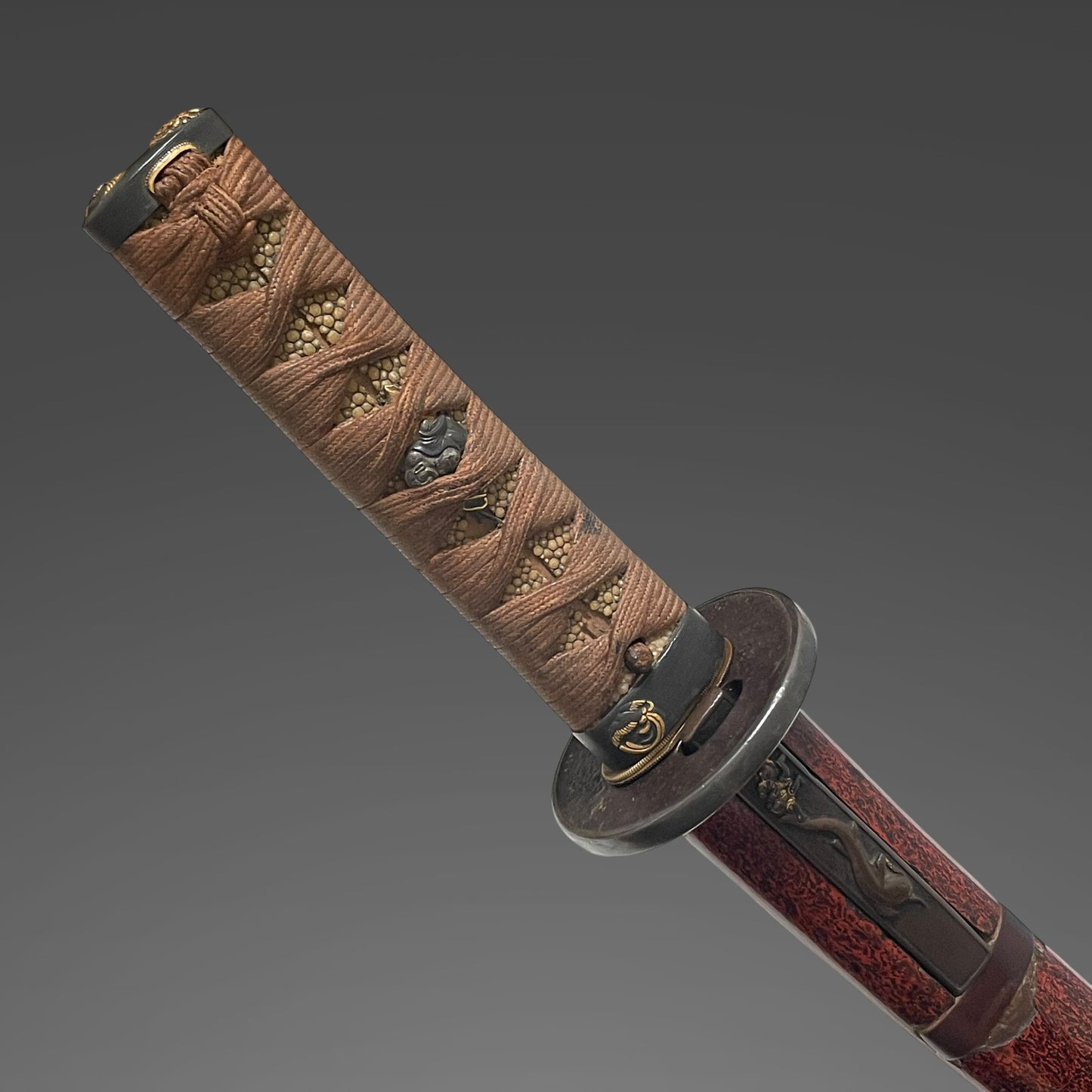 Red Wakizashi Catfish Kozuka,  Tsuda Echizennokami Sukehiro August 1681 signed