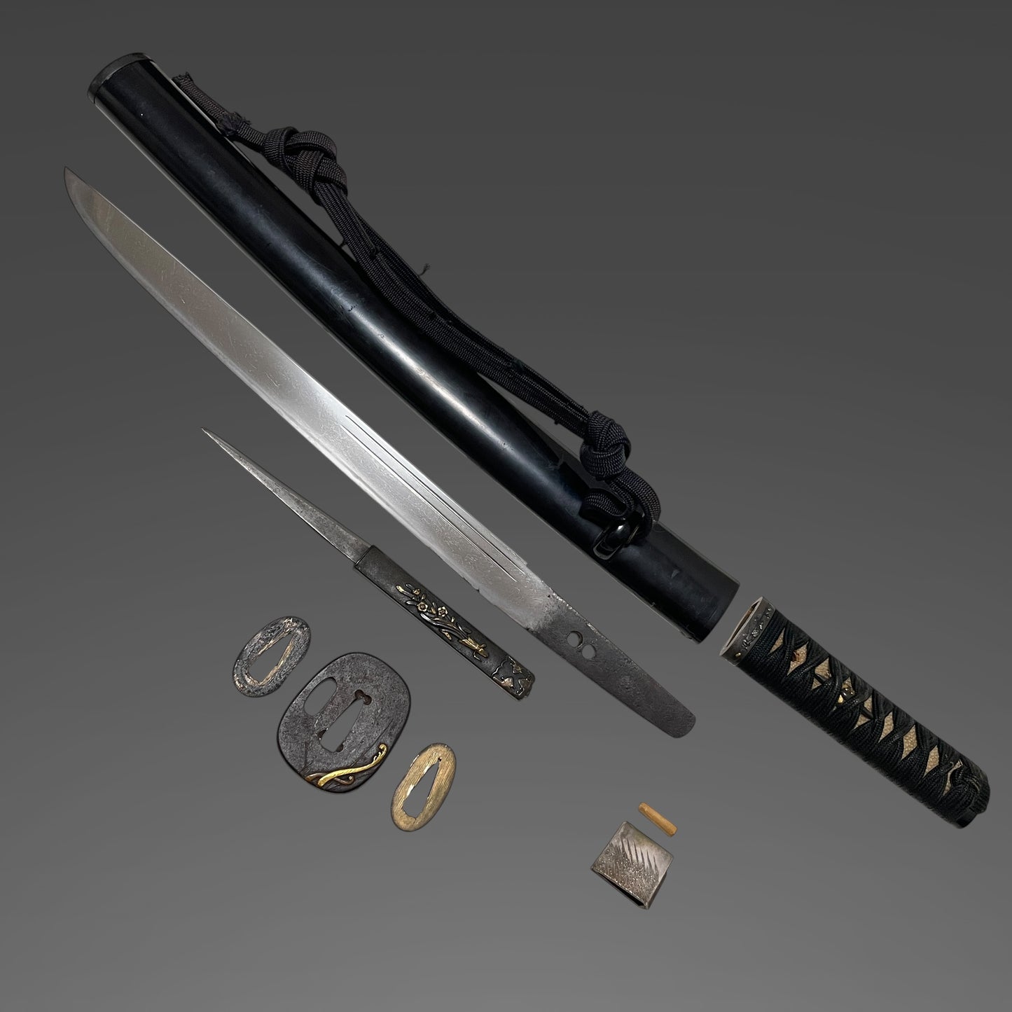 Toshinaga 利壽 signed Fuchi, Black TANTO with Kozuka, Muromachi period mumei, with Shirasaya