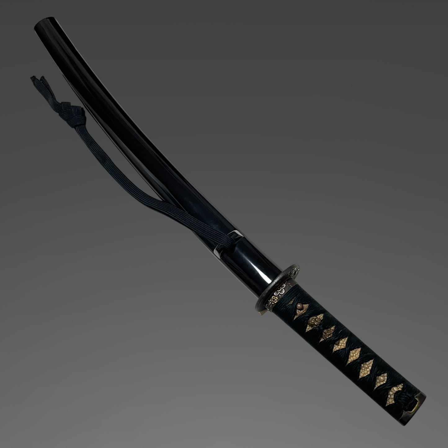 Short Black Wakizashi, Dragon Menuki and Bird Tsuba, Edo period mumei